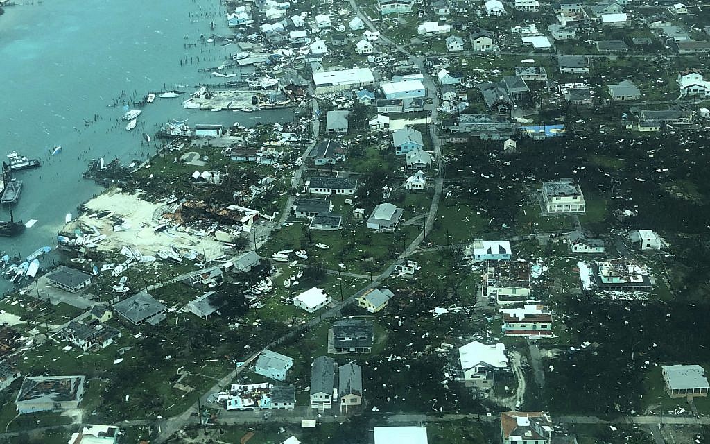 This aerial photo provided by Medic Corps, shows the destruction brought by Hurricane Dorian on Man-o-War cay, Bahamas, Tuesday, Sept.3, 2019 (Medic Corps via AP)