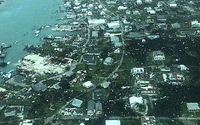 This aerial photo provided by Medic Corps, shows the destruction brought by Hurricane Dorian on Man-o-War cay, Bahamas, Tuesday, Sept.3, 2019 (Medic Corps via AP)