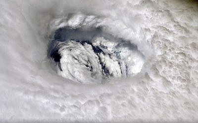 This Sept. 2, 2019 photo provided by NASA shows the eye of Hurricane Dorian shown from the International Space Station. (Nick Hague/NASA via AP)