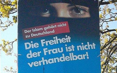 Election poster of the 'Alternative for Germany' party in local elections at Schleswig-Holstein, 2018. The text says: "Islam doesn't belong to Germany", "Freedom of the woman ist not negotiable!" (Wikipedia/Author: Rosenkohl)