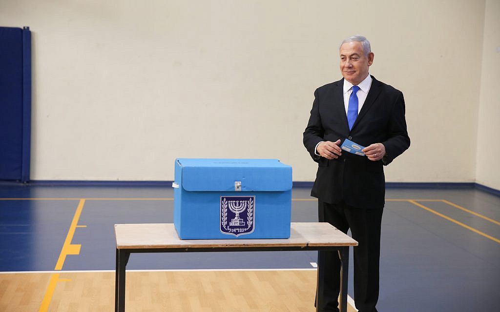 Israeli Prime Minister Benjamin Netanyahu prepares to cast his ballot during the Israeli legislative elections, at a polling station in Jerusalem, 17 September 2019. Israelis are heading to the polls for a second general election, following the prior elections in April 2019, to elect the 120 members of the 22nd Knesset, or parliament. According to the Israel Central Bureau of Statistics, about six million people are eligible to vote. Photo by: Alex kolomoisky-JINIPIX