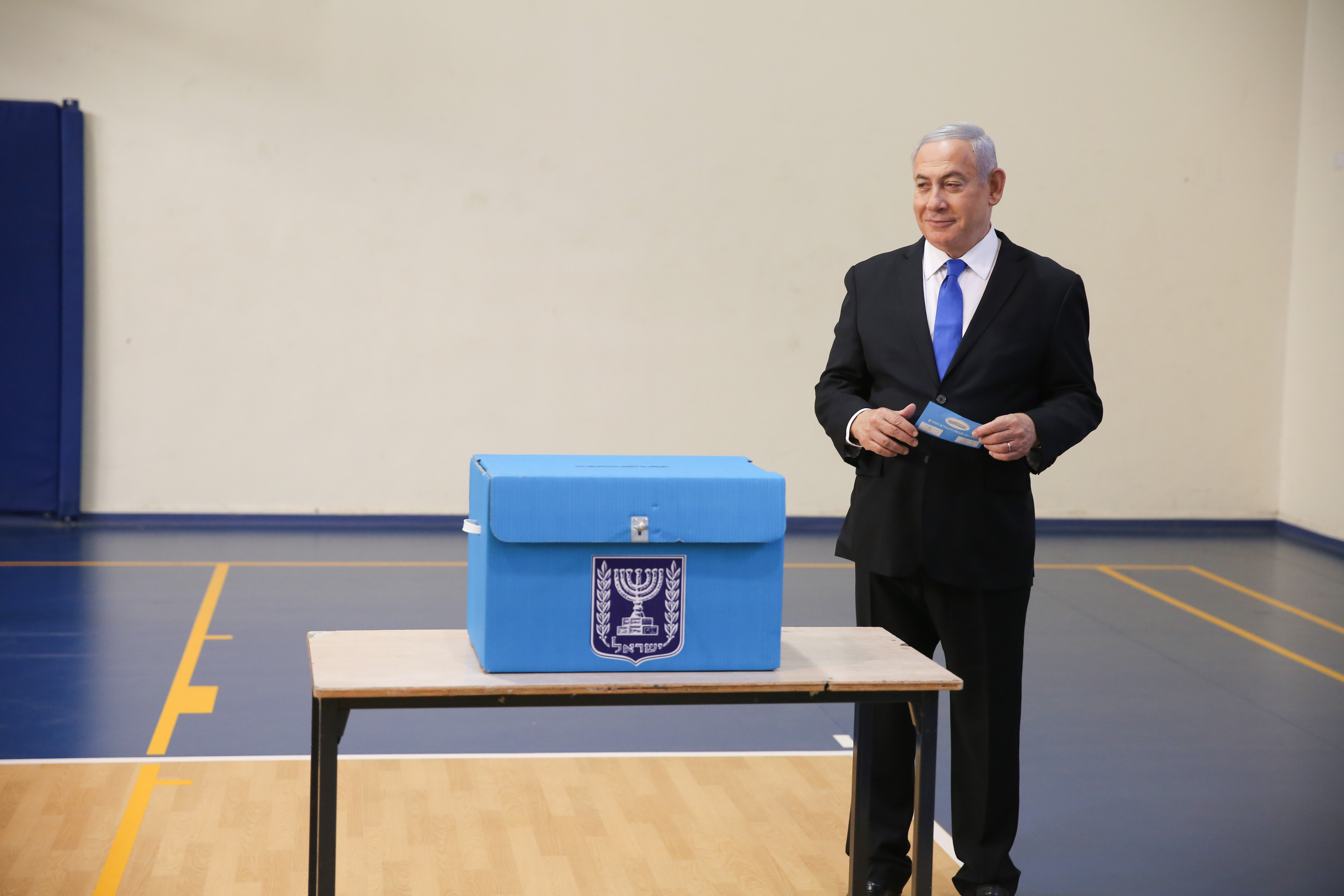Israeli Prime Minister Benjamin Netanyahu prepares to cast his ballot during the Israeli legislative elections, at a polling station in Jerusalem, 17 September 2019. Israelis are heading to the polls for a second general election, following the prior elections in April 2019, to elect the 120 members of the 22nd Knesset, or parliament. According to the Israel Central Bureau of Statistics, about six million people are eligible to vote. Photo by: Alex kolomoisky-JINIPIX