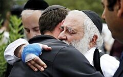 Rabbi Yisroel hugs a member of the congregation of Chabad of Poway the day after a deadly shooting took place there, on Sunday, April 28, 2019 in Poway, Calif. (Credit Image: © TNS via ZUMA Wire) Rabbi Yisroel hugs a member of the congregation of Chabad of Poway the day after a deadly shooting took place there, on Sunday, April 28, 2019 in Poway, Calif. (Credit Image: © TNS via ZUMA Wire)