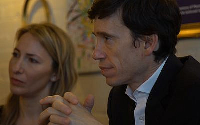 Rory Stewart listens intently during a trip to north London's Jewish community. He toured Golders Green and visited JW3.