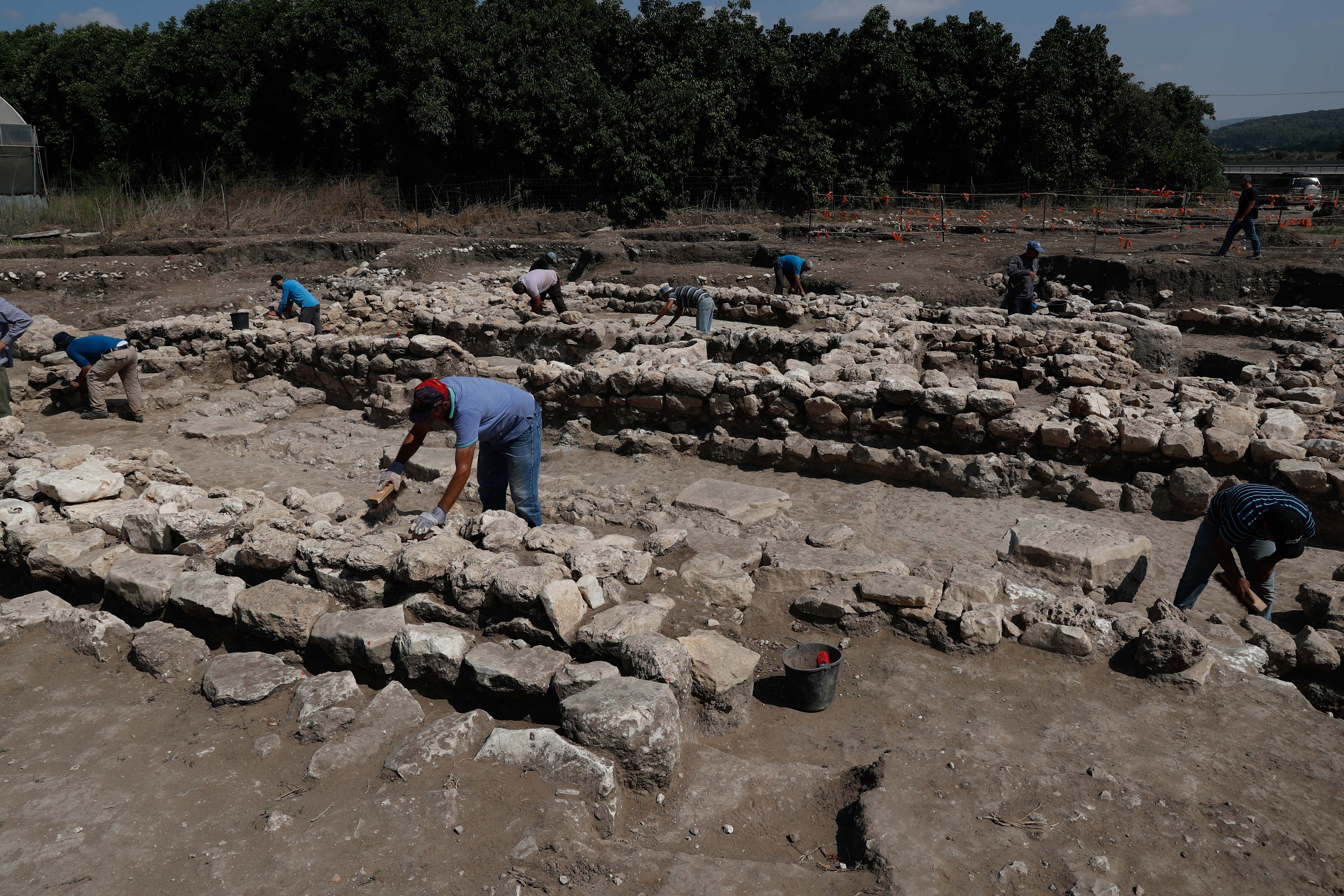 Israeli archaeologists work at the ancient site of En Esur (Ein Asawir) where a 5000-year-old city was uncovered, near the Israeli town of Harish on October 06, 2019. Photo by: JINIPIX