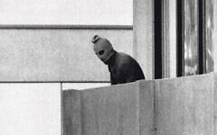 September 1972, an armed Palestinian on a balcony, after terrorists took Israeli team members hostage September 1972, an armed Palestinian on a balcony, after terrorists took Israeli team members hostage