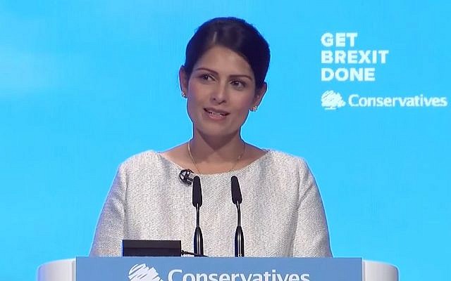Priti Patel addressing the Conservative conference in Manchester (Credit: YouTube)