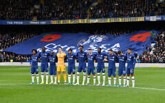 Players and fans of Chelsea observe a minute of silence in honour of Remembrance Day prior to the Premier League match between Chelsea FC and Crystal Palace at Stamford Bridge. (Photo by Chris Lee - Chelsea FC/Chelsea FC via Getty Images) Players and fans of Chelsea observe a minute of silence in honour of Remembrance Day prior to the Premier League match between Chelsea FC and Crystal Palace at Stamford Bridge. (Photo by Chris Lee - Chelsea FC/Chelsea FC via Getty Images)