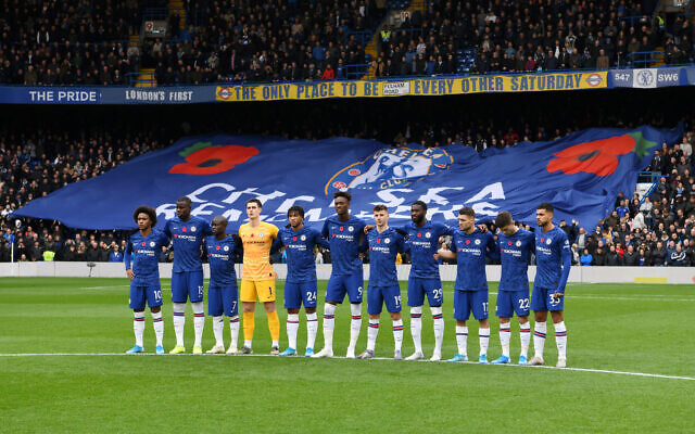 Players and fans of Chelsea observe a minute of silence in honour of Remembrance Day prior to the Premier League match between Chelsea FC and Crystal Palace at Stamford Bridge. (Photo by Chris Lee - Chelsea FC/Chelsea FC via Getty Images)