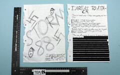 Photo issued by Counter Terrorism Police North East of the cover and an excerpt taken from a 16 year old's 'manifesto' shown to a jury at Manchester Crown Court. (Photo credit: Counter Terrorism Police North East/PA Wire) Photo issued by Counter Terrorism Police North East of the cover and an excerpt taken from a 16 year old's 'manifesto' shown to a jury at Manchester Crown Court. (Photo credit: Counter Terrorism Police North East/PA Wire)