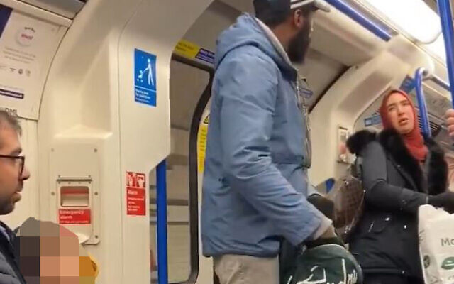 Screengrab taken with permission from the Twitter feed of Chris Atkins of a woman defending a family being harassed and targeted with antisemitic abuse by a man on a Northern Line train on Friday afternoon. (Photo credit: Chris Atkins/PA Wire)