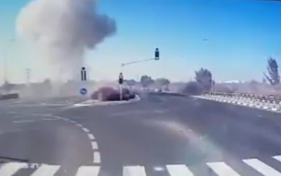 Screenshot from Twitter shows the moment a rocket hit a busy Israeli road