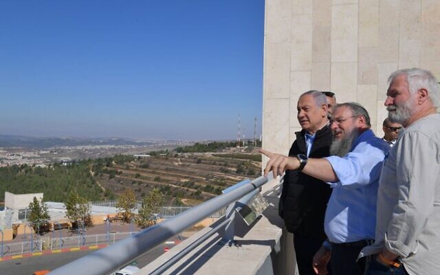 Bibi Netanyahu looking over the West Bank after the US policy change on settlements