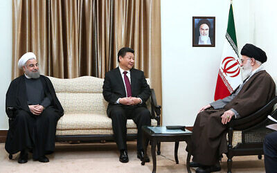 Chinese Xi Jinping with Ali Khamenei (right) and president Hassan Rouhani. Ayatolla Khomeini is in the portrait on the wall
 (BICOM/Jewish News)