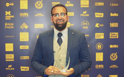 Yusuf Patel with his award at the No2H8 Awards