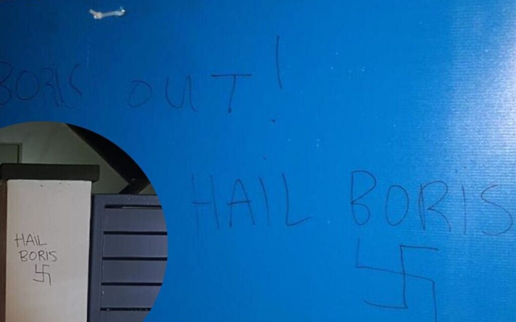 Graffiti daubed on Mike Freer's campaign poster and outside a residential address in Golders Green (Credit: Shomrim North West London)