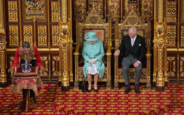 Queen Elizabeth II and the Prince of Wales sit in the chamber, alongside them is The Imperial State Crown, ahead of the State Opening of Parliament by the Queen, in the House of Lords at the Palace of Westminster in London. PA Photo. Picture date: Thursday December 19, 2019. See PA story POLITICS Speech. Photo credit should read: Leon Neal/PA Wire