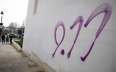 Anti-semitic graffiti in the form of a 9/11 sprayed onto the outside of the South Hampstead Synagogue in North London. PRESS ASSOCIATION Photo. Picture date: Sunday December 29, 2019. See PA story POLICE Graffiti. Photo credit should read: Aaron Chown/PA Wire