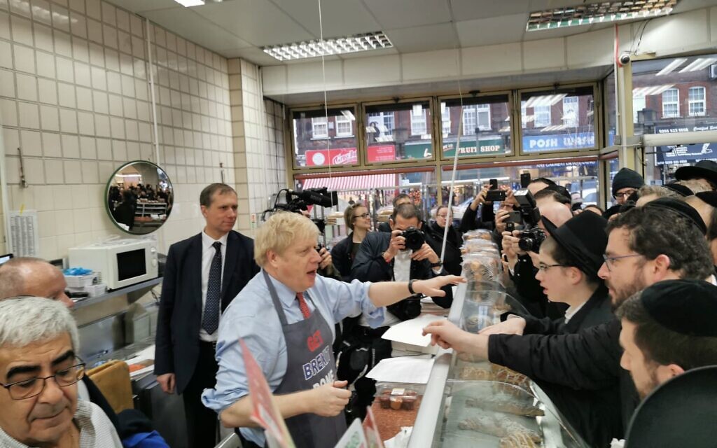 Boris Johnson serving doughnuts on the campaign trail at Grodzinski bakery in Golders Green