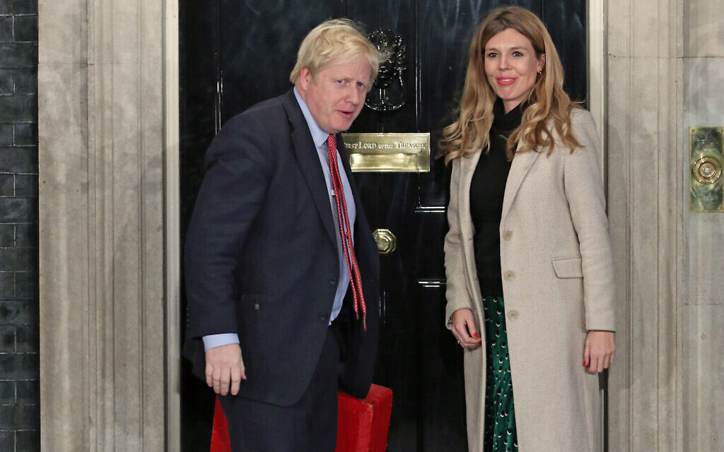 Prime Minister Boris Johnson and his fiancé Carrie Symonds. (Photo credit should read: Yui Mok/PA Wire)