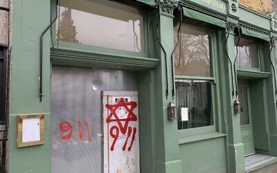 Antisemitic graffiti at what used to be the Hampstead Cafe (James Sorene on Twitter)