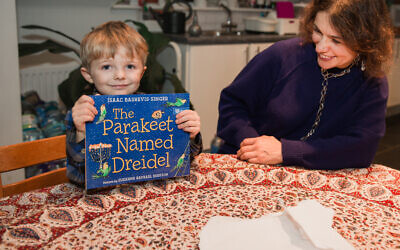 Four-year-old Mischa Sharp received a Chanukah title called The Parakeet Named Dreidel last week, to mark the charity’s landmark.