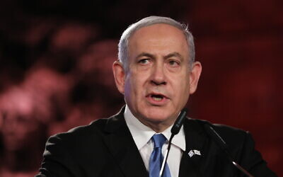 Israeli Prime Minister Benjamin Netanyahu speaks during the Fifth World Holocaust Forum at the Yad Vashem Holocaust memorial museum in Jerusalem, Israel,    (Abir Sultan, Pool via AP)