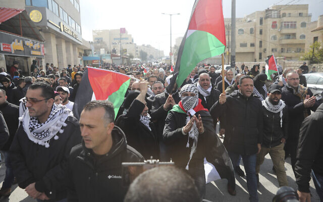 Palestinians protest Middle East peace plan announced Tuesday by US President Donald Trump, which strongly favors Israel, in Bethlehem, West Bank, Wednesday, Jan 29, 2020. (AP Photo/Mahmoud Illean)