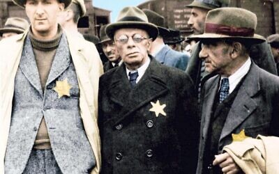 Auswitchz: Untold in Colour: Jewish men wearing yellow Star of David badges arrive at

Auschwitz