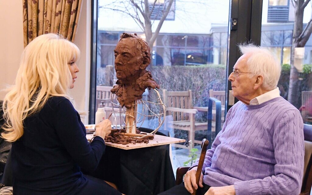 Frances Segelman at Jewish Care's Selig Court sculpting Freddie Knoller (Credit: Sophie Dunne)