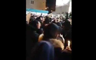 Screenshot from Twitter video showing a vigil outside the Islamic centre