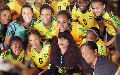 Cedella with the Jamaica girls soccer team
