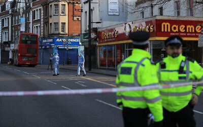 Forensic officers at the scene following the terror attack in Streatham High Road, south London by Sudesh Amman, (Photo credit: Aaron Chown/PA Wire)
