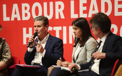 Sir Keir Starmer speaks during the community's Labour leadership hustings, alongside Lisa Nandy (Credit: Marc Morris)