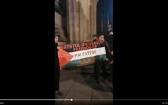 Anti-Israel demonstrators protest against former British Army commander Col. Richard Kemp and Brig. Gen. Yossi Kuperwasser, at Bristol University