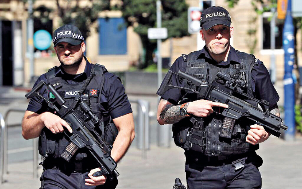 Armed police officers

 

(Photo credit: Danny Lawson/PA Wire)