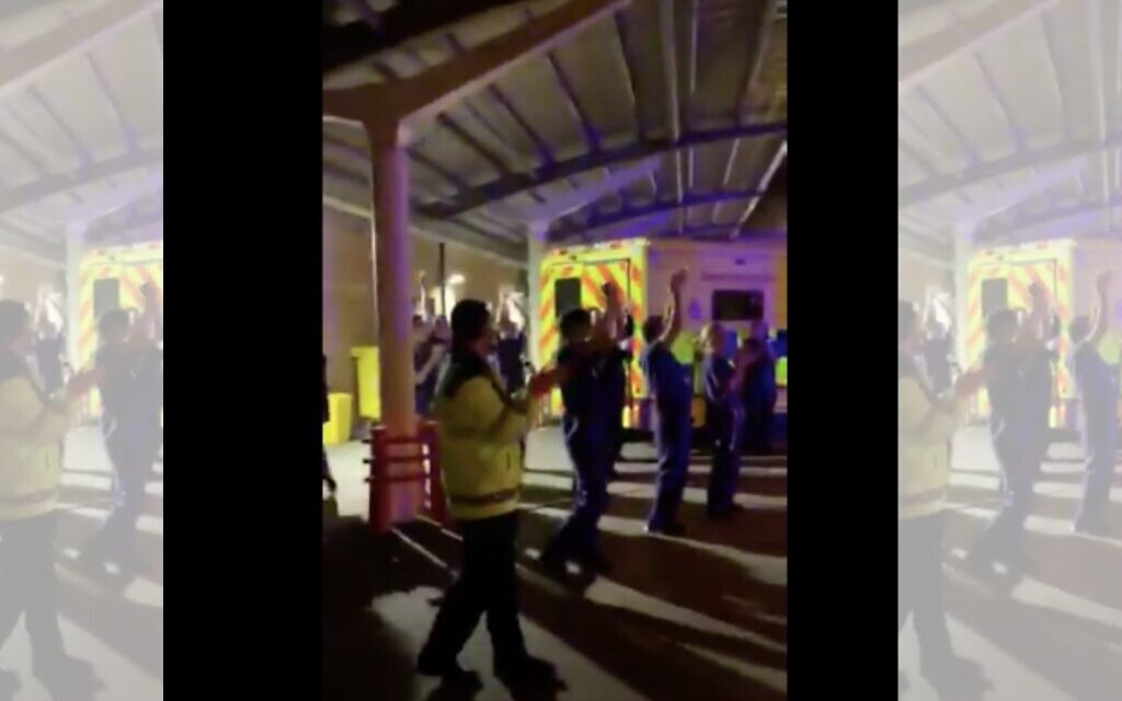 Hatzola volunteers applauding carers and NHS workers on Thursday evening as part of public clapping tribute