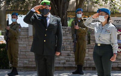 Israeli soldiers at Mount Qiryat Shemona Cemetery as Israel marks Memorial Day for the fallen soldiers and victims of terror on April 28, 2020. This year, due to the outbreak of the Coronavirus, there will be restrictions on going to the cemeteries on Memorial Day itself. Photo by: Ayal Margolin-JINIPIX