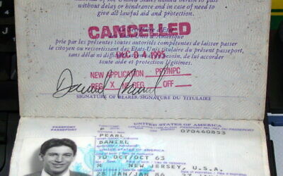 Daniel Pearl's passport, on display in the Newseum, Washington, D.C. (Wikipedia/Author:	Queerbubbles/Attribution-ShareAlike 3.0 Unported (CC BY-SA 3.0)  https://creativecommons.org/licenses/by-sa/3.0/legalcode)