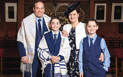 Anita Feldman with her husband Jonathan and sons, Sam and Adam, in a photograph taken two weeks ago at the Mosaic Jewish Community synagogue in Harrow (Photos by James Shaw Photography)