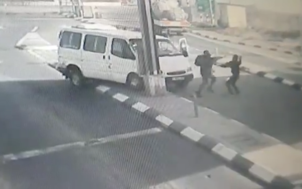 Screenshot from Twitter showing the moment a Palestinian attacker drives his car into a settlement before attempting to stab a police officer