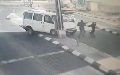 Screenshot from Twitter showing the moment a Palestinian attacker drives his car into a settlement before attempting to stab a police officer