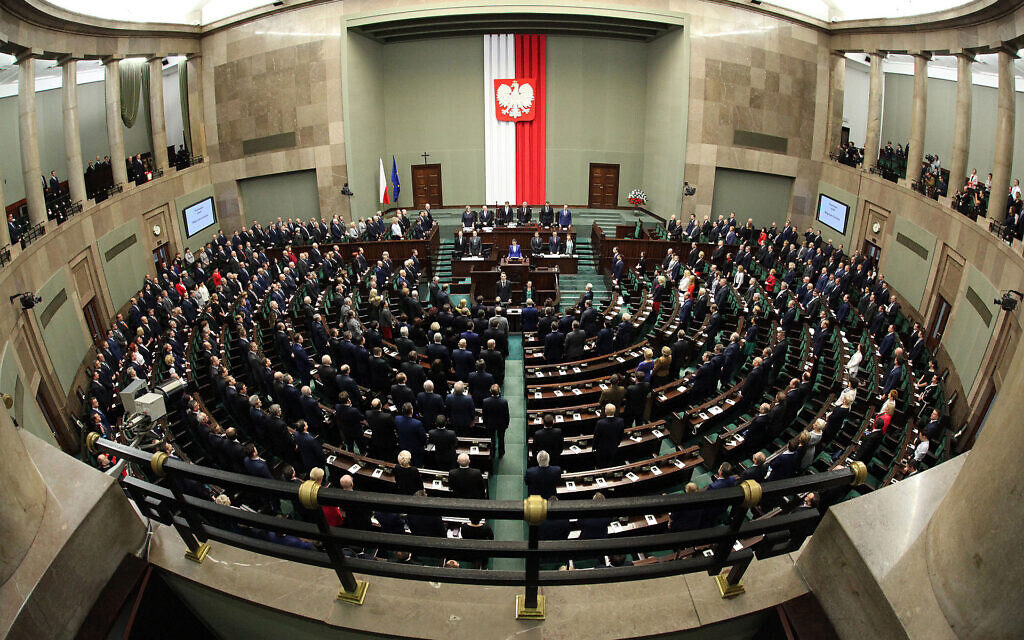 Sejm Meeting Hall

(Wikipedia/ The Chancellery of the Senate of the Republic of Poland / Source	Senat Rzeczypospolitej Polskiej/
Author	Katarzyna Czerwińska)