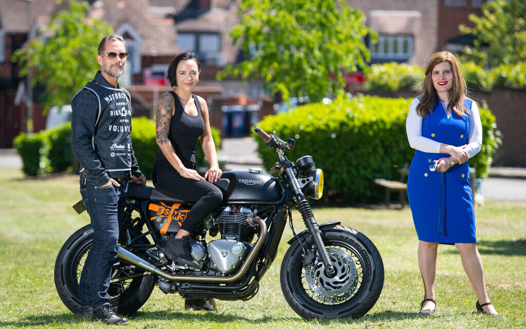 Doctor Sharon Raymond (right) who set up the Urgent Oximeter Rescue service, with founders of the Bike Shed motorbike club Dutch and Vikki van Someren, in Brent Park, north west London. (Photo credit: Dominic Lipinski/PA Wire) Doctor Sharon Raymond (right) who set up the Urgent Oximeter Rescue service, with founders of the Bike Shed motorbike club Dutch and Vikki van Someren, in Brent Park, north west London. (Photo credit: Dominic Lipinski/PA Wire)