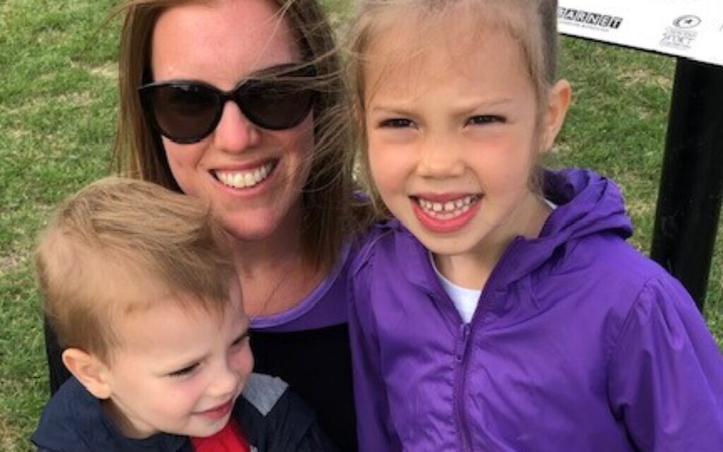 Amy Woolf, the chair of Jewish Care families is pictured with her children Georgia, 5, and Max, 3, participating in the Fun Run