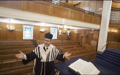 Chazan singing inside his empty shul about longing for communal