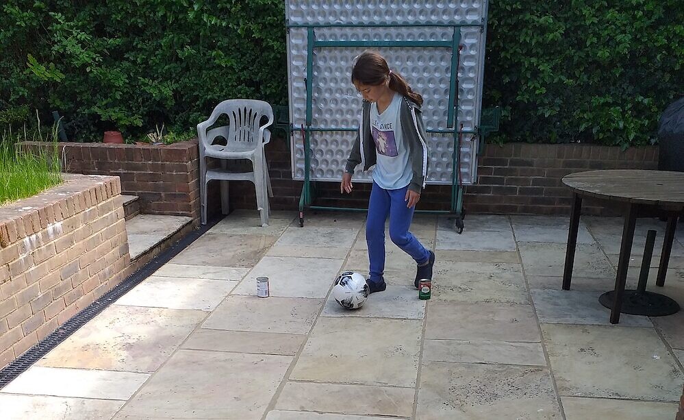Lucy Waks, 10, playing football!