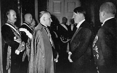 Hitler meeting the Cesare Orsenigo,  Apostolic Nuncio to Germany during the war. January 1, 1935. (Wikipedia/ From the US Holocaust Museum, In the public domain / Author- 	Claireislovely)