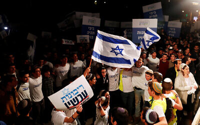 Israeli youth demonstrate as they call on Israeli Prime Minister Benjamin Netanyahu to declare sovereignty over Israel's settlements in the occupied West Bank, in Jerusalem February 13, 2020. The Hebrew writing reading, "Sovereignty Now". Picture taken February 13, 2020. REUTERS/Ronen Zvulun
