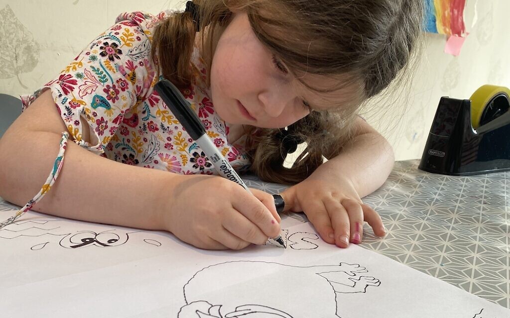 Maisie Balkind, 5, drawing during Paul Solomons' cartoon class!